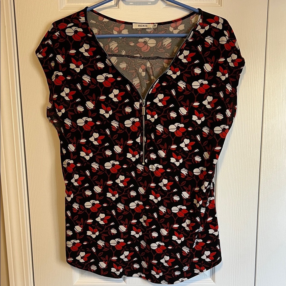 Ricki’s Black and Red Floral Women's top with front zip adjustable neck opening